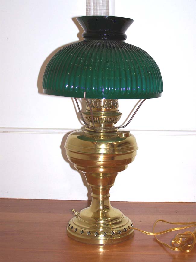 An American Brass Oil Lamp signed 'Brevete 1883, now electrified